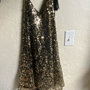 Gold sequin dress with open back